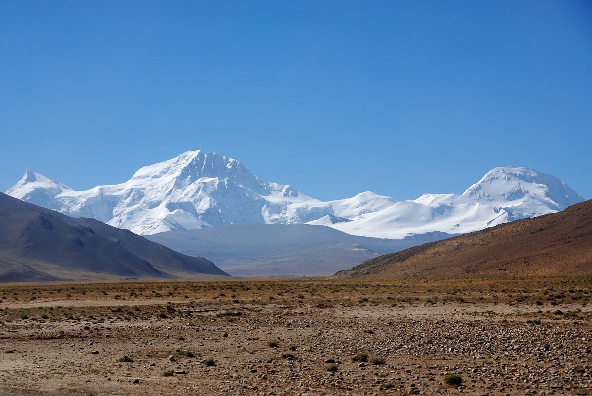 09 Phola Gangchen, Shishapangma And Porong Ri From After Shishapangma Checkpoint But then after driving a little further from Shishapangma Checkpoint, you can look back to the left west and Phola Gangchen and Shishapangma come into view again with and Porong Ri (7292m) on the far right.